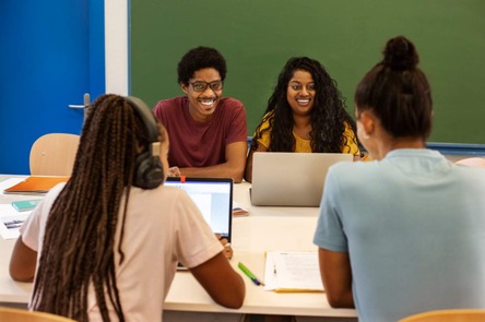Students working together around a table