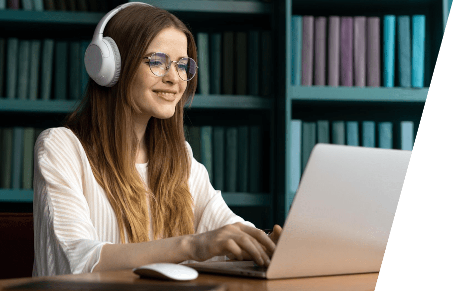 Student attending an online class on a laptop