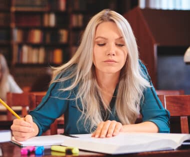 Student studying in a library